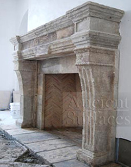 Antique reclaimed limestone fireplace mantel getting reclaimed